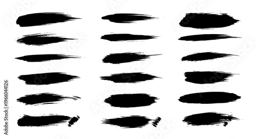 Set of artistic ink brush strokes on white background