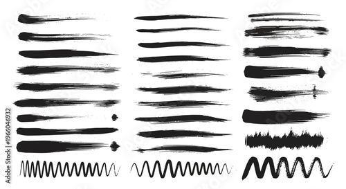 Collection of artistic grunge brush strokes in black on white background