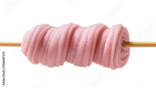 Photos Sweet pink fluffy candy roll on a wooden stick, isolated on transparent backgrou