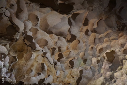 Inside one of the numerous cave with stalactites and stalagmites in Vietnam