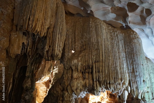 Inside one of the numerous cave with stalactites and stalagmites in Vietnam