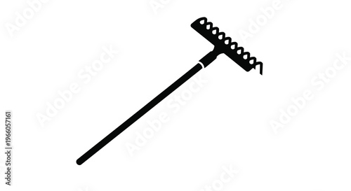 A black silhouette of a garden rake against a white background