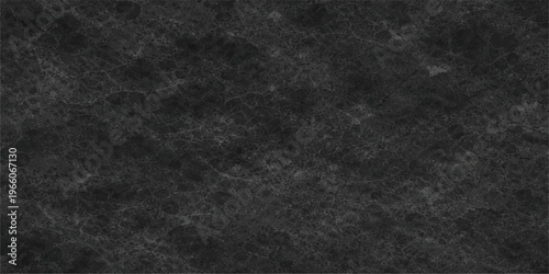 A high resolution dark grey marble stone surface with intricate natural texture and subtle patterns