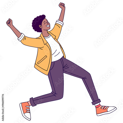 Happy young man jumping with arms raised and fists clenched