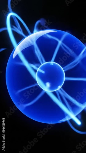 Electric blue plasma globe with glowing arcs and sparks on dark background, science and technology concept