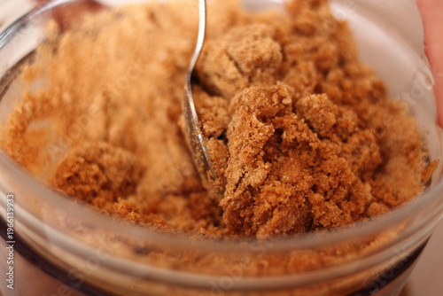 Combine melted butter and ground cookies. Making frozen strawberry cheesecake series.