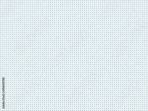 A white surface with many small black dots