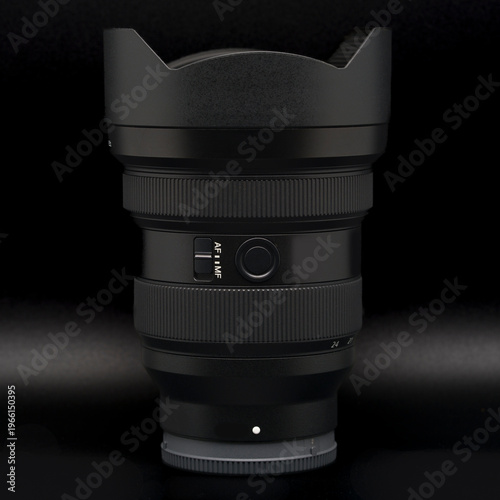 Obraz na plátně A 12-24 mm ultra wide-angle zoom lens on a black background