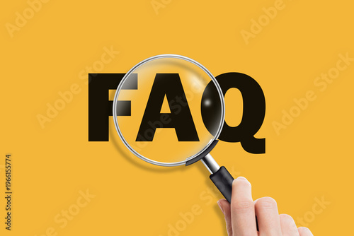 FAQ and magnifying glass on yellow background. Frequently asked questions.