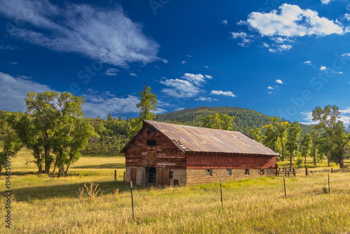 Old wooden barn in a field