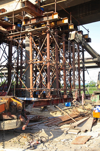Scaffolding Support Crane at Damaged Bridge Construction Site Emergency Repairs