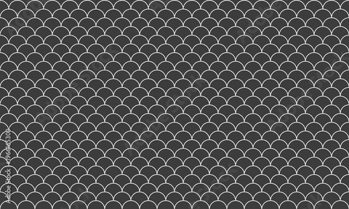 Elegant grayscale fish scale pattern.  Perfect for backgrounds, textures, website design, or print projects.  This seamless design offers a sophisticated, subtle texture.