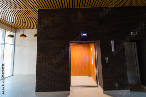 Modern elevator entrance in contemporary building interior design