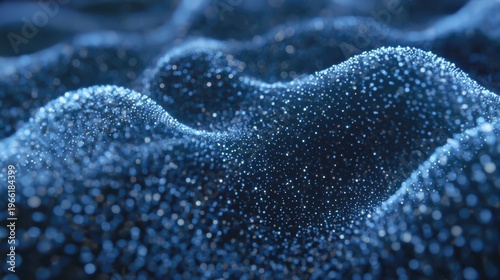 Abstract flowing waves of glowing blue particles in a dark digital landscape