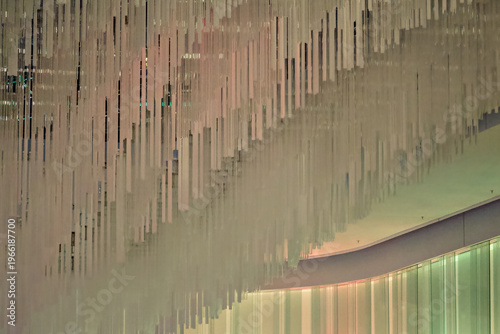 Bild auf Leinwand Cascading vertical rod ceiling installation