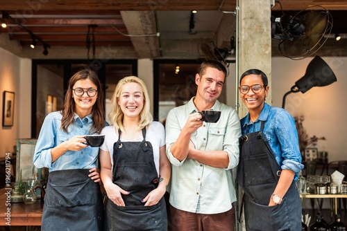 Photos Happy baristas enjoying coffee together