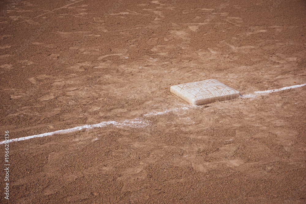 Fotografie Base on baseball and softball field dirt