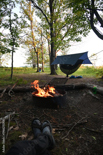 Relaxing by the camp fire on Oak Island in the Apostle Islands National Lakeshore on Lake Superior.
