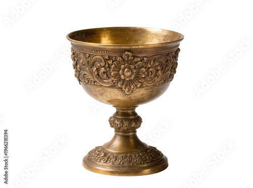 фотографія Isolated ornate antique golden chalice with intricate floral carvings and metal