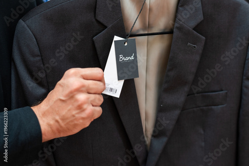 Tableau sur toile Elegant suit with brand tag