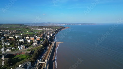 Dawlish, Devon, England: DRONE VIEWS: The drone flies over Dawlish railway station and the mainline track. Dawlish is a popular UK tourist destination on the mainline railway to London Paddington.