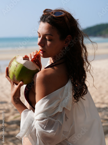 happy young woman on the beach