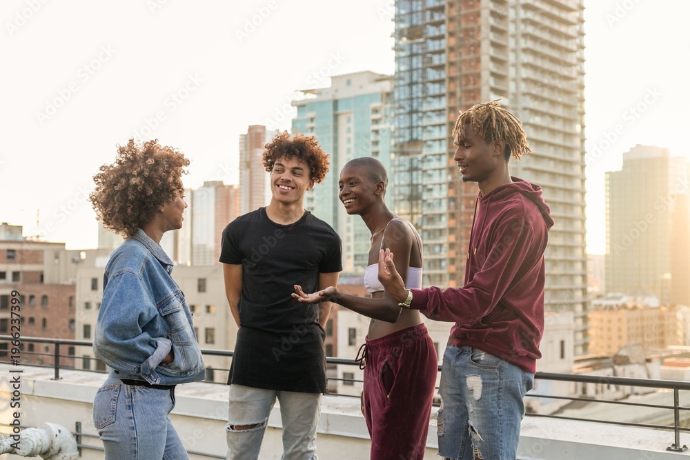 Fototapeta premium Friends enjoying rooftop conversation photo