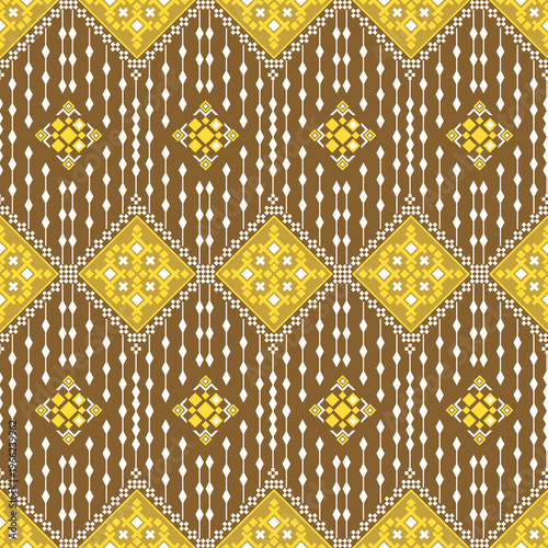 Seamless geometric ethnic tribal pattern in brown and yellow