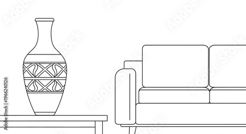 Elegant Decorative Vase with Intricate Pattern on Table.