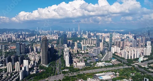 Aerial view of the modern financial district and skyscraper skyline in Shenzhen, China.
