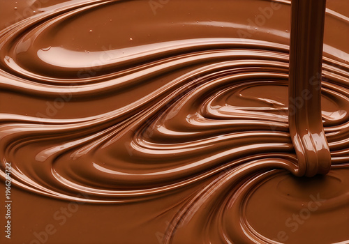Swirling chocolate sauce elegantly drizzled on a dark surface