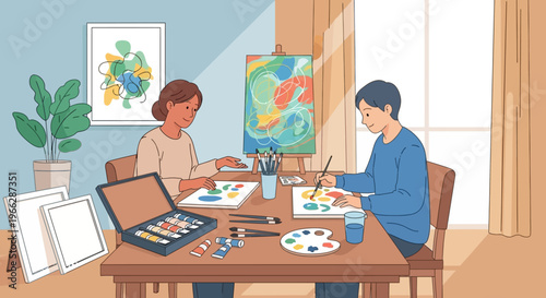 Man and woman painting at table.