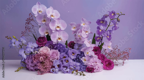 Beautiful purple and pink flowers arrangement with orchids and roses on white table