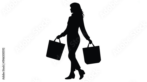 silhouette of woman walking with shopping bags in both hands