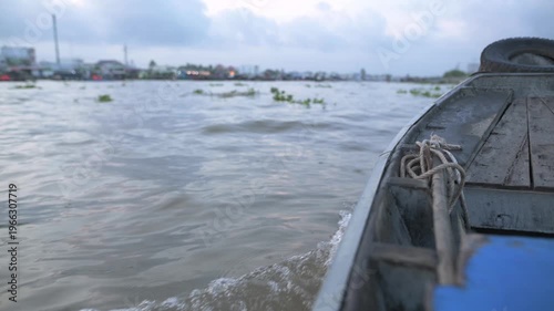 Lively River Visualization. Animated Depiction Of Flowing River With Vessel And Plants. Vivid Illustration Capturing Lively Movement Of Boat Among Floating Plants In Flowing River