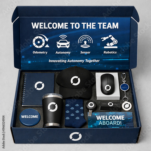 Premium employee onboarding gift box with custom drinkware notebooks lanyard apparel and desk accessories creating a polished corporate welcome experience for new team members during orientation