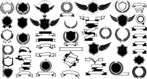 Black and White Heraldic Design Elements. A vector set of vintage shields, wreaths, wings, and blank ribbons for creating logos and crests.