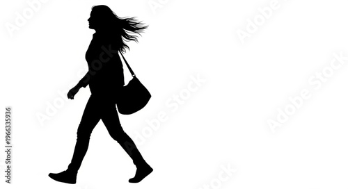 Silhouette of a Woman Walking with a Shoulder Bag.