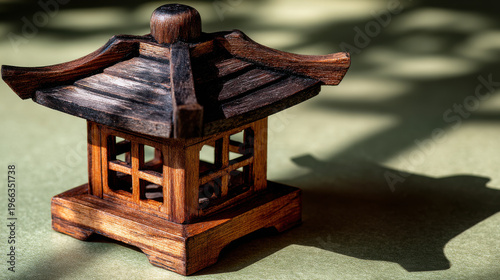 Beautiful wooden temple sits off beaten path casting intricate shadows that enhance its charm and elegance