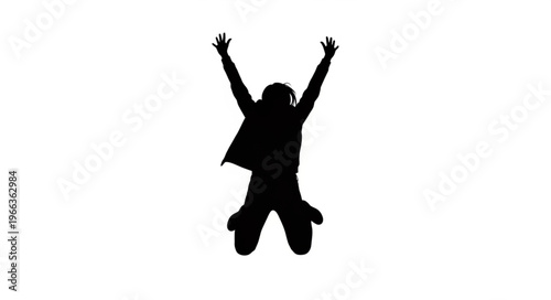 Silhouette of a person jumping with arms raised in celebration.