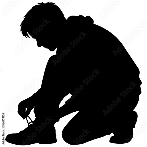 Silhouette of a young person tying shoelaces on a sneaker
