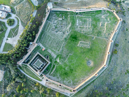 square towers,machicolations,cylindrical towers,cisterns,Torre della Leonessa,Underground passages,Torre del Re,Strategic hilltop,Puglia,Lucera Castle,13th Century palace,14th Century walls,Angevine G