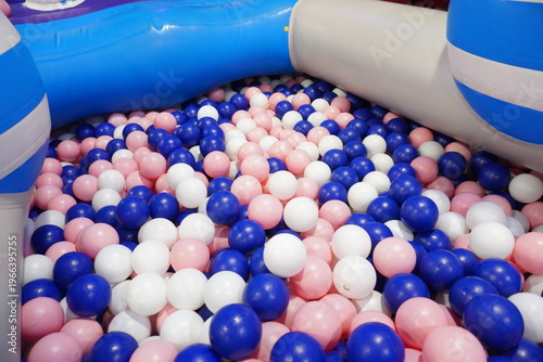 Colorful plastic balls in a childrens ball pit at an indoor playground