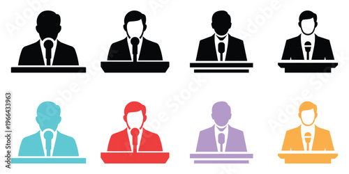 Businessmen sitting at desks in various colors suits