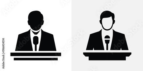Two black and white businessmen speaking at podiums