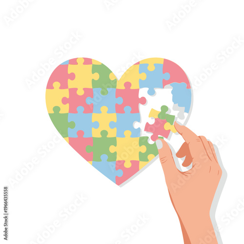 Heart puzzle completion, hand placing last piece, autism awareness, love and connection concept