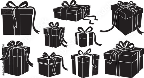 Black gift boxes with ribbons and bows on white background