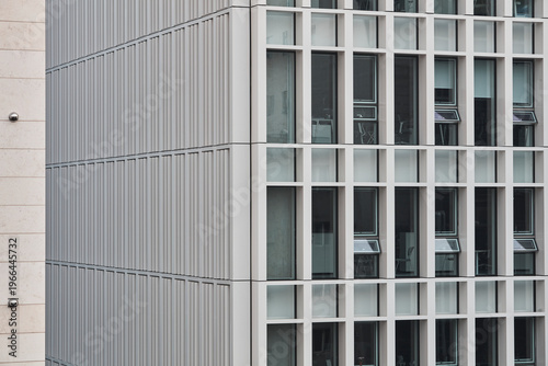 Konstfotografi Close grid facade of contemporary building with repeating recessed windows