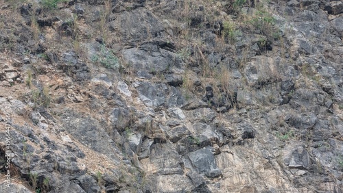 Sloping mountain body covered with rocks