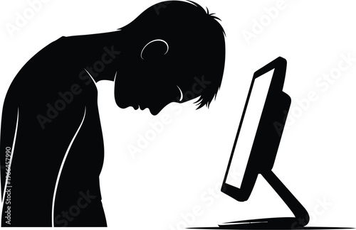 Person looking down at a computer screen silhouette